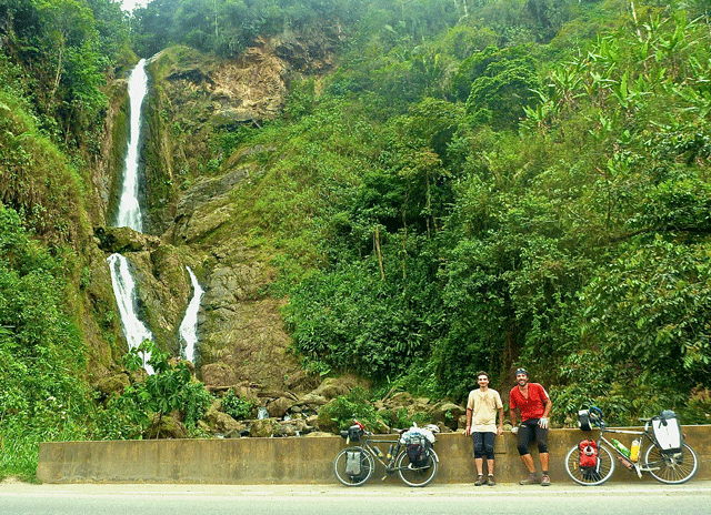 Two blokes, two bikes, and a waterfall