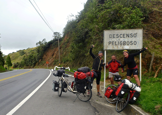 Chris, Jerome, and Mel celebrate the last hill north of Medellin